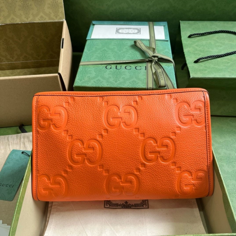 G*u*i clutch bags